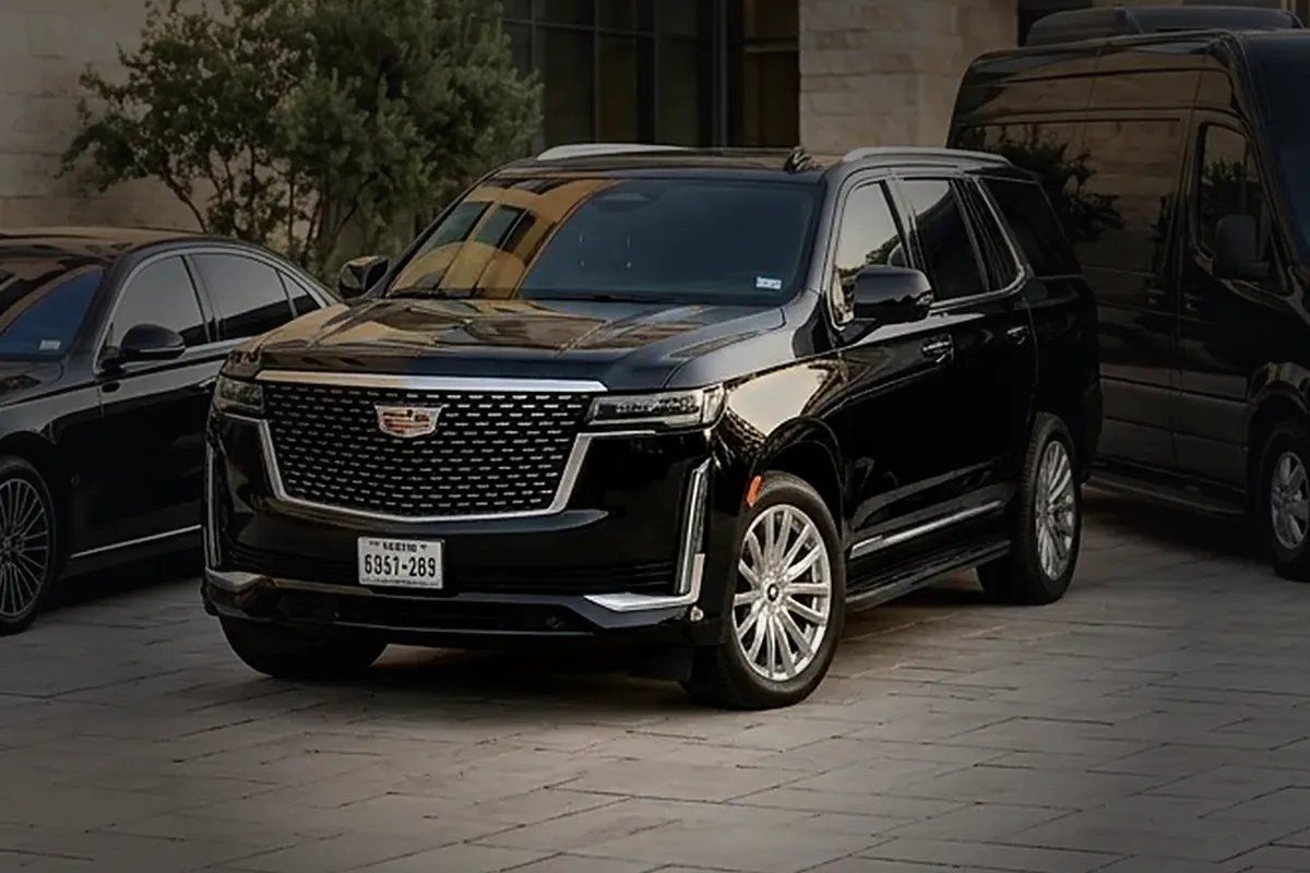 Black luxury SUV, front three-quarter view