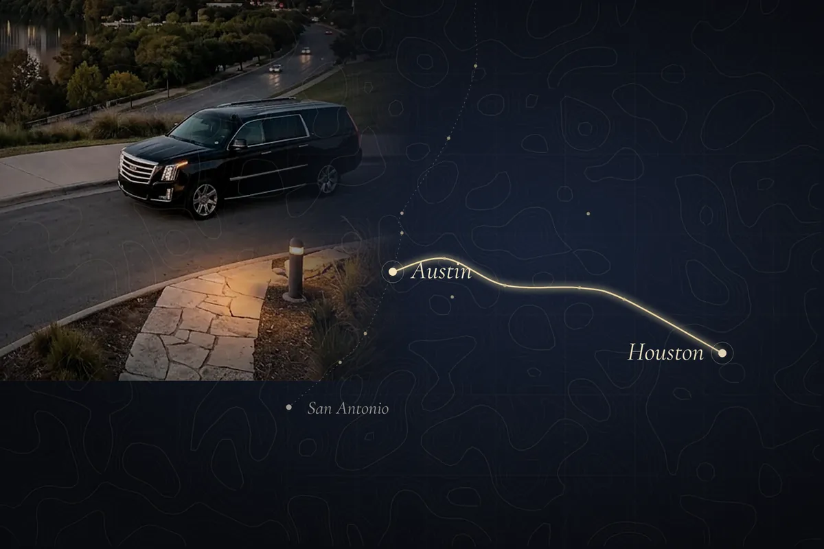 Black SUV on a Texas highway with Houston skyline in the distance